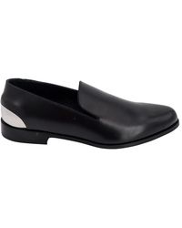 McQueen - Schwarze Flache Schuhe Mit Metall-Logo-Detail - Lyst