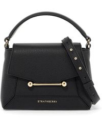 Strathberry - Genarbte leder nano-tasche mit metallstab - Lyst