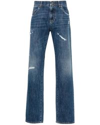 Dolce & Gabbana - Jeans blu con strappi gamba dritta - Lyst