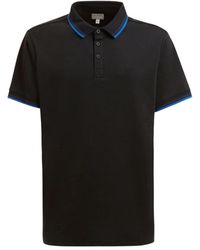 Guess - Polo in tessuto nero - Lyst