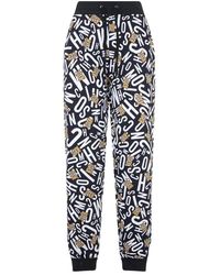 Moschino - Moderne Sportbroek Met Grafische Print - Lyst