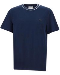 Lacoste - Tops ,Blauw ,Katoen Stretch Piqué T-Shirt Met Gestreepte Kraag - Lyst