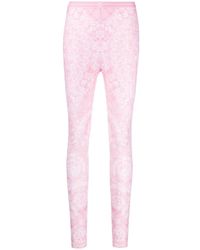 Versace - Pantalón super-skinny rosa con estampado barroco - Lyst