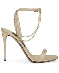 Dolce & Gabbana - Sandali dorati con dettagli a lucchetto - Lyst