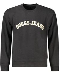 Guess - Schwarzer Baumwollpullover Mit Rippbündchen - Lyst