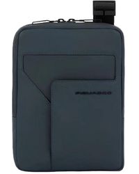 Piquadro - Grüne schultertasche mit rfid-schutz und tasche für ipad mini - Lyst