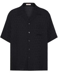 Valentino Garavani - Camicia da bowling in seta nera con stampa logo - Lyst