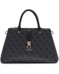 Guess - Handbags - Lyst