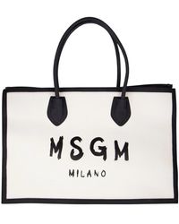MSGM - Sandfarbene tote tasche mit schwarzen kontrastkanten und maxi-logo - Lyst