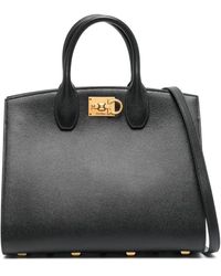 Ferragamo - Schwarze handtasche aus strukturiertem leder mit goldener hardware - Lyst