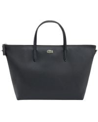 Lacoste - Handbags - Lyst