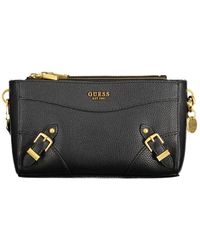 Guess - Schicke schwarze handtasche mit kontrastdetails - Lyst