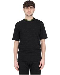 Moschino - Magliette uomo nera con logo all-over e colletto elastico - Lyst