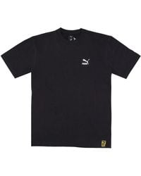 PUMA - Zwarte Staple Tee Met Oosterse Inspiratie - Lyst