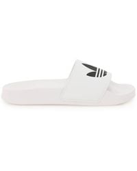 adidas Sandals, slides and flip flops for Men | Online Sale up to 70% off |  Lyst