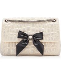 Balenciaga - Bow-Detailed Washed Leather Crossbody Bag - Lyst
