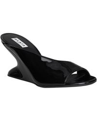 Alaïa - Patent Leather Wedge Mules - Lyst