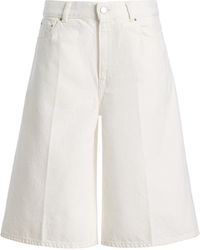 TOTEME - Denim Board Shorts - Lyst