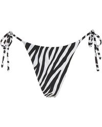 AEXAE - Tyra String Bikini Bottom - Lyst