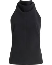 KHAITE - Rone High Collar Crepe Top - Lyst