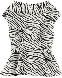 ARAKII - Exclusive Peplum Cotton-blend Top - Lyst
