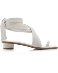 tibi flats