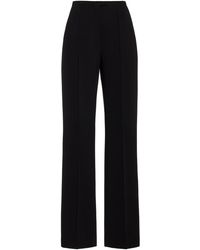The Row - Desmond Stretch-wool Flare Pants - Lyst