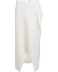KHAITE - Jaia Asymmetric Wool Midi Skirt - Lyst