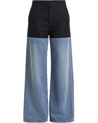 Alaïa - Basque Hybrid Wide-Leg Jeans - Lyst