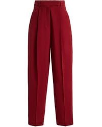 Rohe - Daria Pleated Wool Tapered Trousers - Lyst
