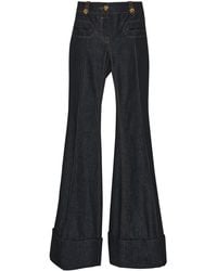 Zimmermann - Rebellion Low-Rise Flare Jean - Lyst