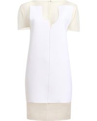 KHAITE - Winona Paneled Crepe Mini Dress - Lyst