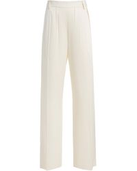Victoria Beckham - Relaxed Mid-Rise Crepe Curved-Leg Trousers - Lyst
