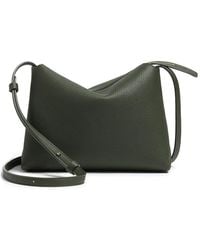 KHAITE - Lina Medium Leather Crossbody Bag - Lyst
