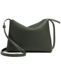 KHAITE - Lina Medium Leather Crossbody Bag - Lyst