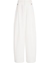 Bottega Veneta - Pleated Compact Cotton Wide-Leg Pants - Lyst