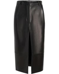 KHAITE - Anden Plonge Leather Midi Skirt - Lyst