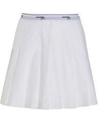 HOMMEGIRLS - Exclusive Pleated Mini Tennis Skirt - Lyst