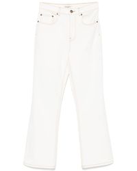 Tory Burch - Flared Leg Denim Jeans - Lyst