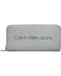 Calvin Klein - Große Damen Geldbörse Sculpted Zip Around Mono K60K607634 - Lyst