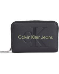 Calvin Klein - Kleine Damen Geldbörse Sculpted Med Zip Around Mono K60K607229 - Lyst
