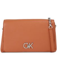 Calvin Klein - Handtasche re-lock shoulder bag md k60k611057 autumn leaf gap - Lyst