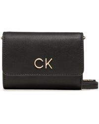 Calvin Klein - Handtasche re-lock trifold sm w/strap k60k611010 bax - Lyst