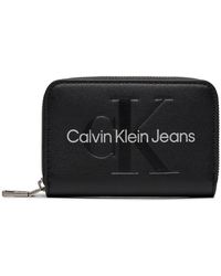 Calvin Klein - Große Damen Geldbörse Sculpted Med Zip Around Mono K60K607229 - Lyst