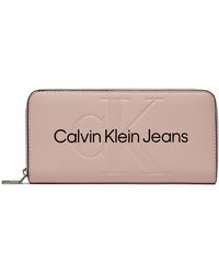 Calvin Klein - Große Damen Geldbörse Sculpted Mono Zip Around Mono K60K607634 - Lyst