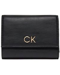 Calvin Klein - Große Damen Geldbörse Re-Lock Trifold Md K60K608994 - Lyst