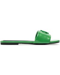 Calvin Klein - Pantoletten Flat Sandal Slide Mg Met Yw0Yw01348 Grün - Lyst