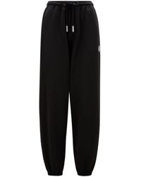 Moncler - Pantalones deportivos con logotipo - Lyst