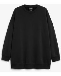 Monki - Oversize-pullover mit rundhalsausschnitt schwarz - Lyst