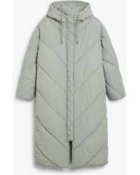 green long puffer coat